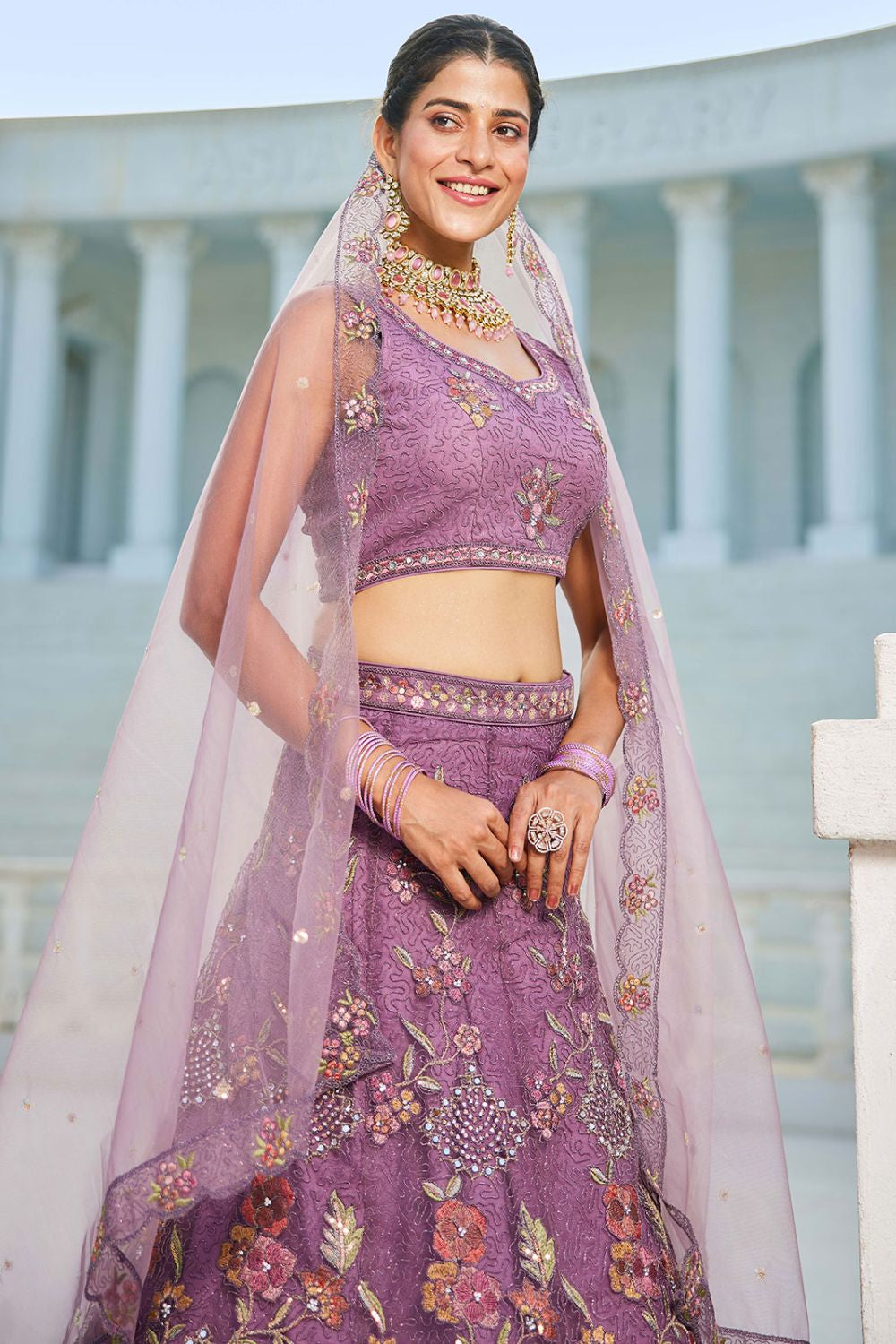 Purple Net Wedding Lehenga With Zari Work SFROY509016