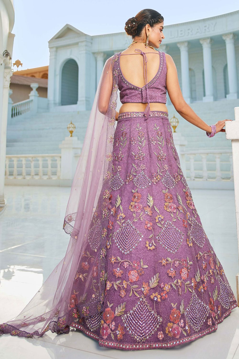 Purple Net Wedding Lehenga With Zari Work SFROY509016